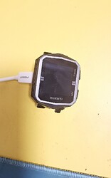 A Huawei smartwatch charging